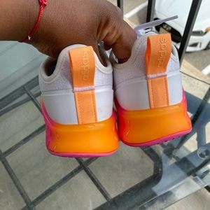 White and rainbow adidas. Worn 2 times, can be thoroughly cleaned if you ask.